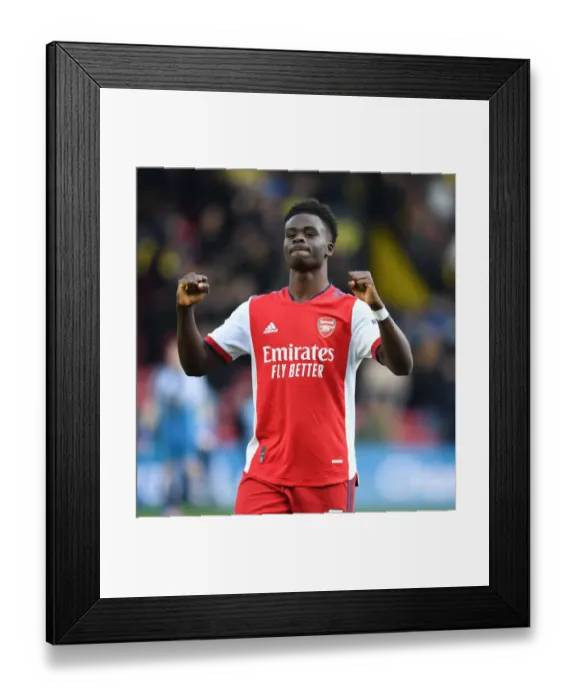 Framed Print : Bukayo Saka's Celebration: Arsenal Secures Victory Over Watford in Premier League Framed Print : Bukayo Saka's Celebration: Arsenal Secures Victory Over Watford in Premier League