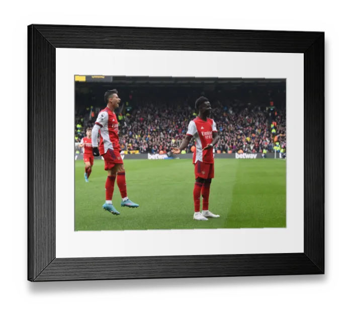 Framed Print : Arsenal's Sensational Young Stars: Saka and Martinelli Celebrate Victory Over Watford in the Premier League 2021-22