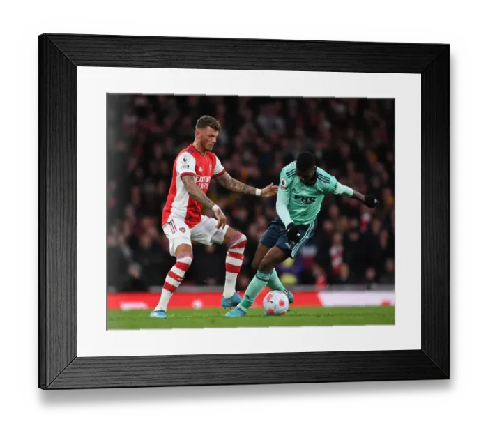 Framed Print : Intense Rivalry: White vs Iheanacho - Arsenal vs Leicester City Battle, Premier League 2021-22 Framed Print : Intense Rivalry: White vs Iheanacho - Arsenal vs Leicester City Battle, Premier League 2021-22