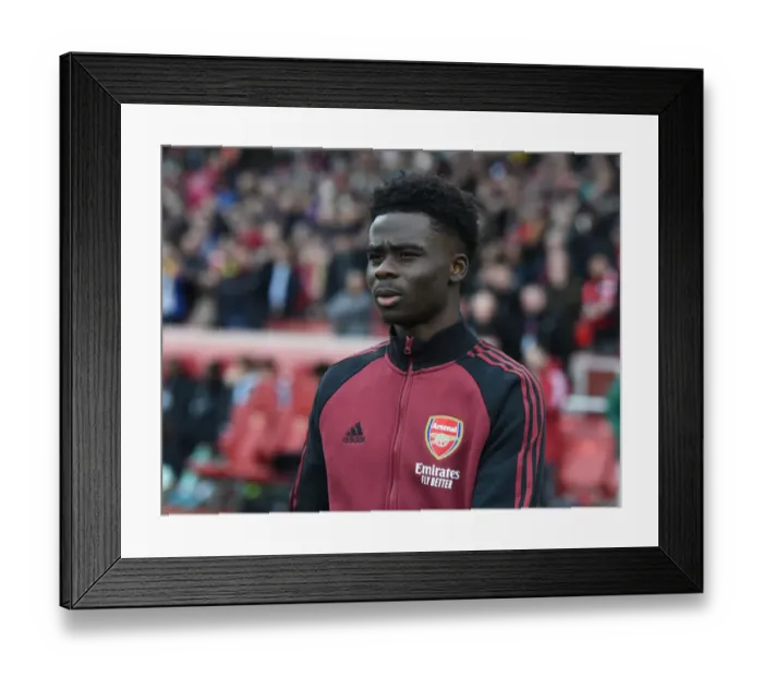 Framed Print : Arsenal's Bukayo Saka Gears Up for Arsenal v Leicester City Clash in Premier League