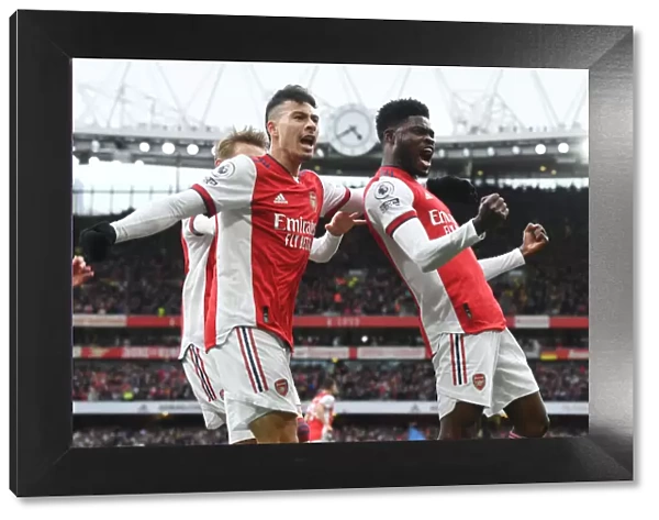 Arsenal's Partey, Martinelli, and Odegaard Celebrate Goal Against Leicester City (2021-22)