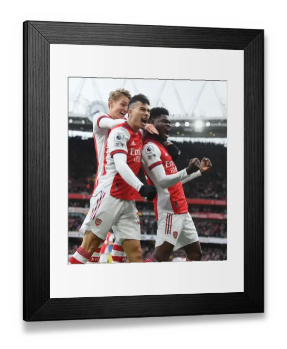 Framed Print : Arsenal's Thomas Partey, Gabriel Martinelli, and Martin Odegaard Celebrate Goal Against Leicester City (2021-22)