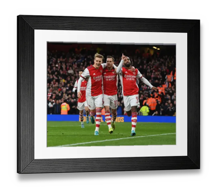Framed Print : Arsenal's Lacazette, Odegaard, and Cedric Celebrate Goals Against Leicester City (2021-22)