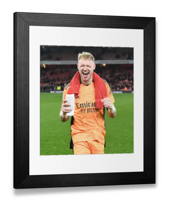 Framed Print : Arsenal's Ramsdale: Thrilling Victory Celebration vs. Leicester City (Premier League 2021-22)