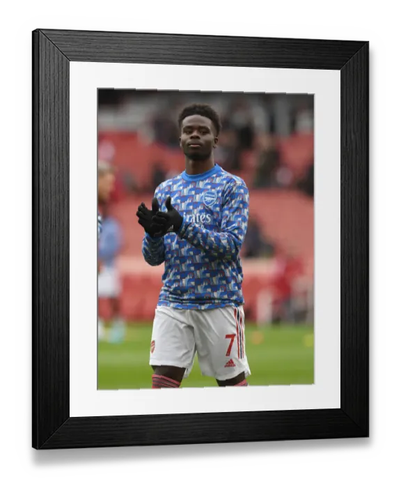 Framed Print : Arsenal's Bukayo Saka Gears Up: Arsenal v Leicester City, Premier League 2021-22