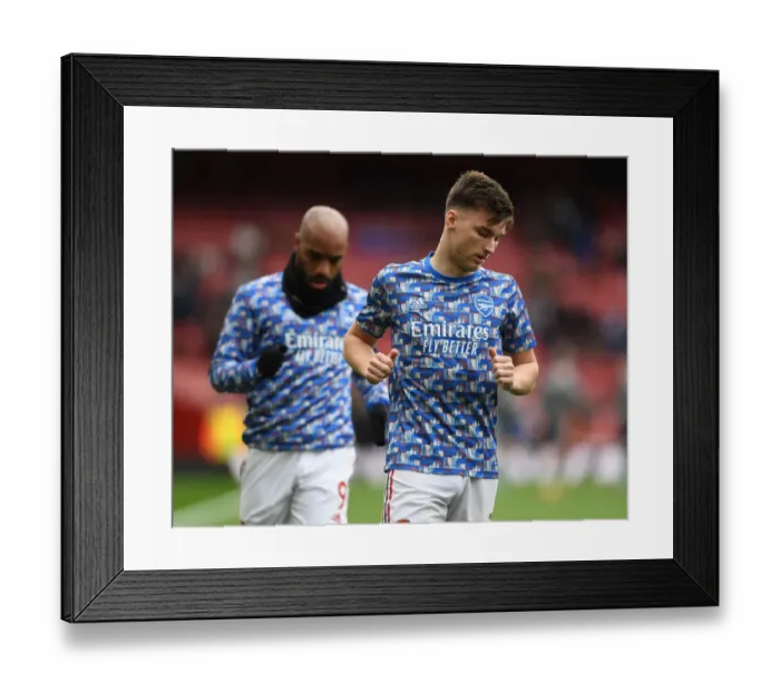 Framed Print : Arsenal's Kieran Tierney Gears Up for Arsenal v Leicester City Clash (2021-22) Framed Print : Arsenal's Kieran Tierney Gears Up for Arsenal v Leicester City Clash (2021-22)