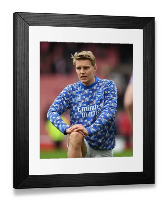 Framed Print : Martin Odegaard's Focus: Arsenal's Readiness vs Leicester City in Premier League Framed Print : Martin Odegaard's Focus: Arsenal's Readiness vs Leicester City in Premier League