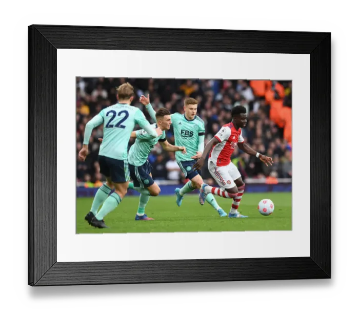 Framed Print : Arsenal vs Leicester City: Bukayo Saka Faces Off Against Harvey Barnes and Luke Thomas Framed Print : Arsenal vs Leicester City: Bukayo Saka Faces Off Against Harvey Barnes and Luke Thomas