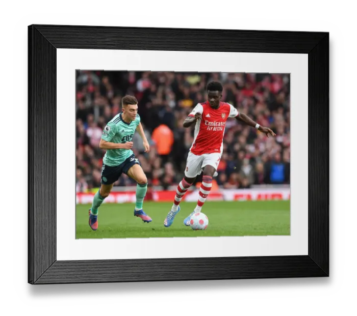 Framed Print : Saka vs. Thomas: A Premier League Battle at Emirates Stadium Framed Print : Saka vs. Thomas: A Premier League Battle at Emirates Stadium