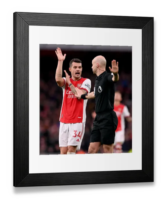 Framed Print : Arsenal vs Leicester City: Granit Xhaka Contests Handball Call in Premier League Clash Framed Print : Arsenal vs Leicester City: Granit Xhaka Contests Handball Call in Premier League Clash