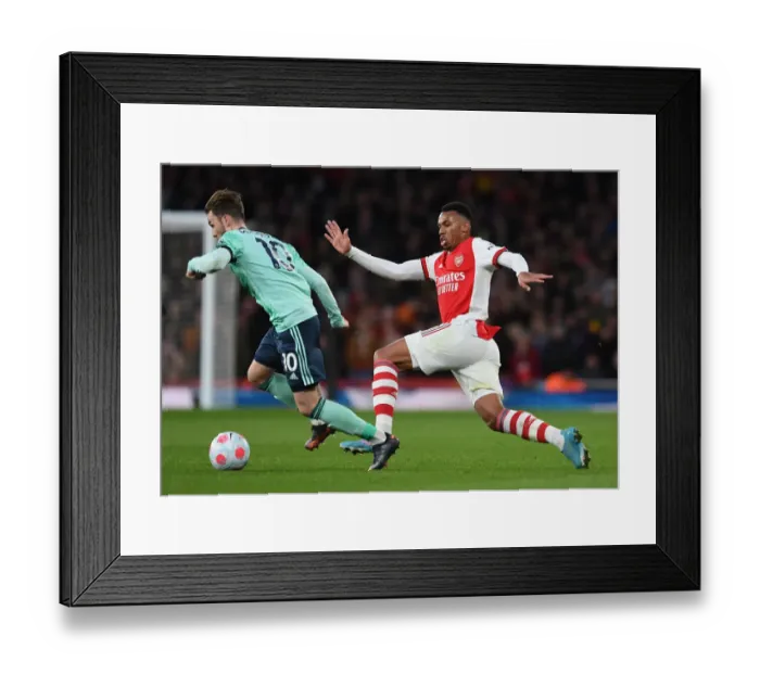 Framed Print : Arsenal vs Leicester City: Gabriel Magalhaes vs James Maddison - Intense Battle at Emirates Stadium (Premier League 2021-22) Framed Print : Arsenal vs Leicester City: Gabriel Magalhaes vs James Maddison - Intense Battle at Emirates Stadium (Premier League 2021-22)