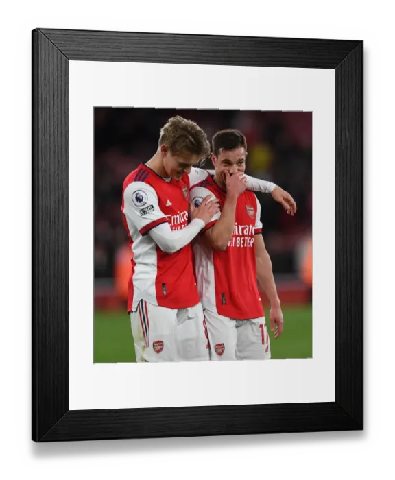 Framed Print : Arsenal: Martin Odegaard and Cedric Soares Share a Moment After Arsenal vs. Leicester City, Premier League 2021-22