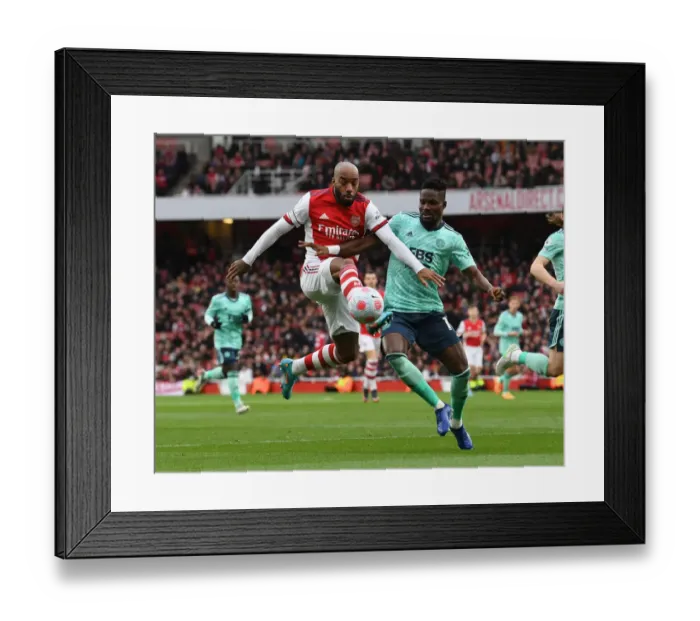 Framed Print : Arsenal's Lacazette Faces Off Against Leicester's Amartey in Premier League Clash Framed Print : Arsenal's Lacazette Faces Off Against Leicester's Amartey in Premier League Clash