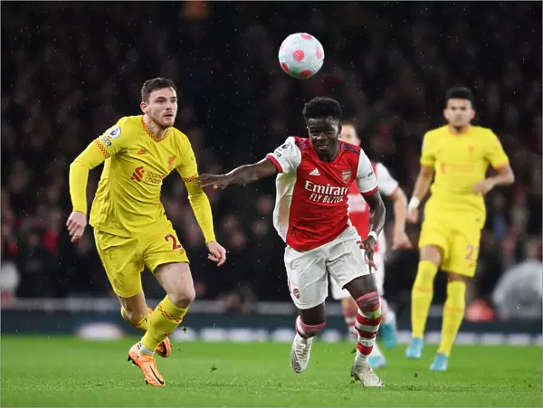 Arsenal vs. Liverpool: Bukayo Saka vs. Andrew Robertson Battle at Emirates Stadium