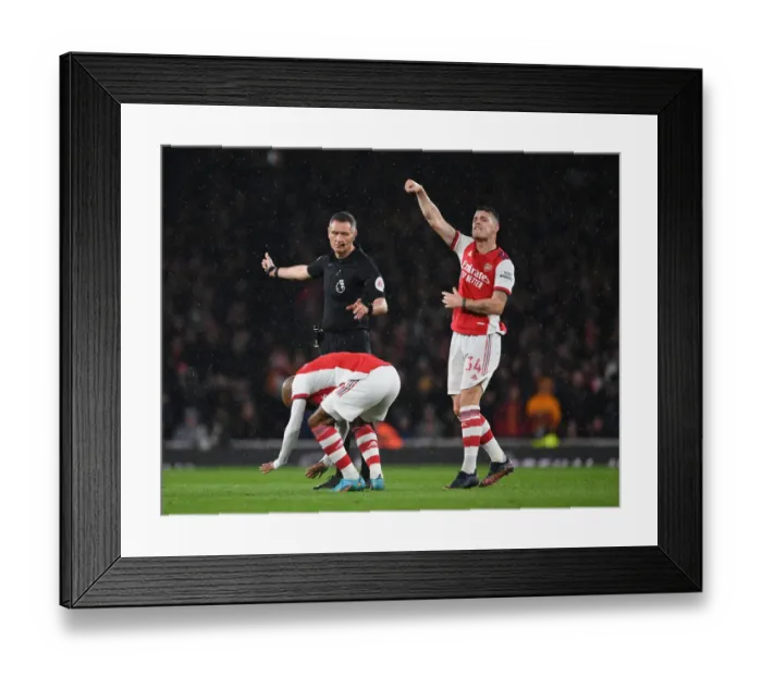 Framed Print : Intense Rivalry: Lacazette and Xhaka's Reaction to Referees Controversial Decision in Arsenal vs. Liverpool