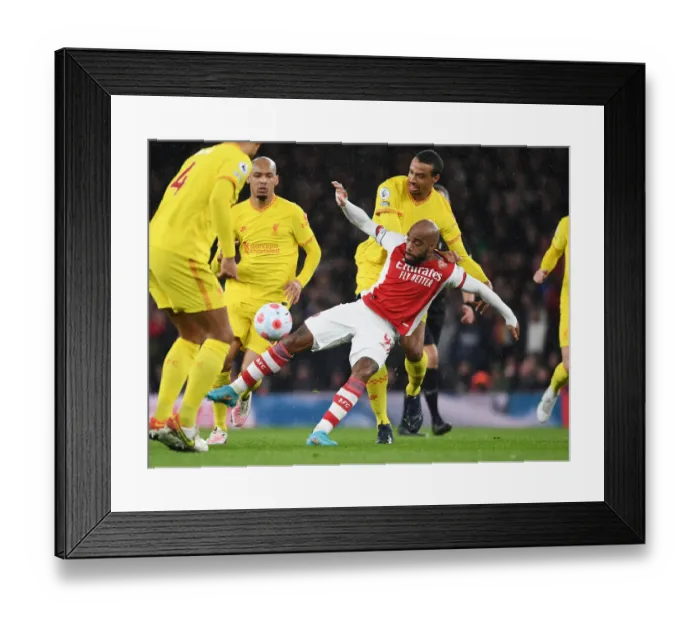 Framed Print : Intense Rivalry: Lacazette vs. Matip Battle in Arsenal vs. Liverpool Premier League Clash