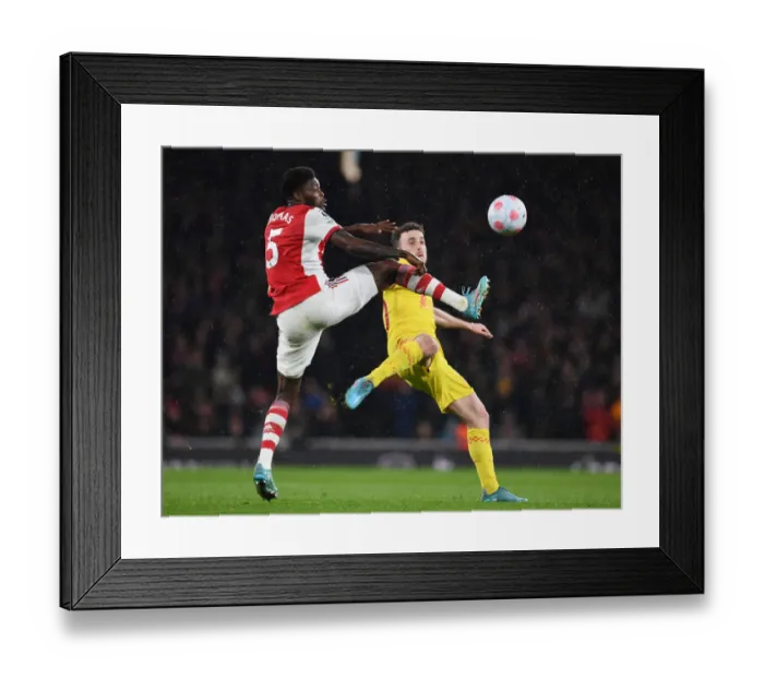 Framed Print : Arsenal vs. Liverpool: Thomas Partey vs. Diogo Jota Battle at Emirates Stadium, Premier League 2021-22 Framed Print : Arsenal vs. Liverpool: Thomas Partey vs. Diogo Jota Battle at Emirates Stadium, Premier League 2021-22