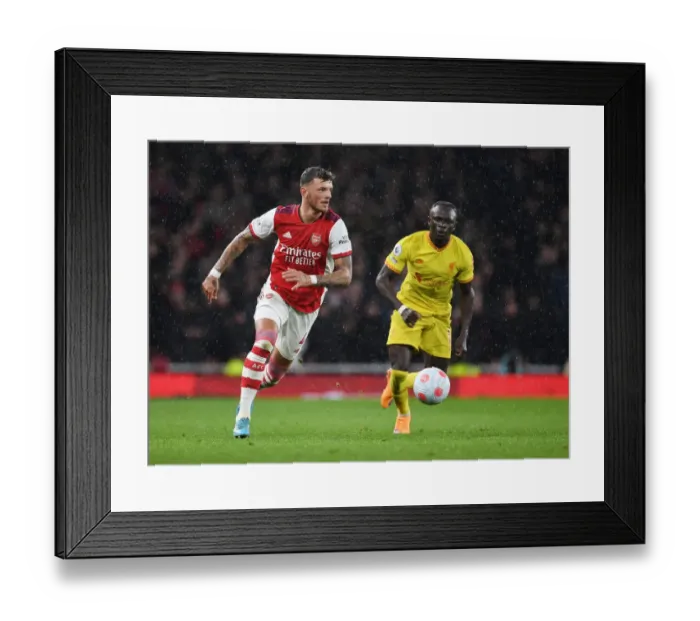 Framed Print : Arsenal's White Stands Firm Against Liverpool's Mane in Intense Premier League Clash