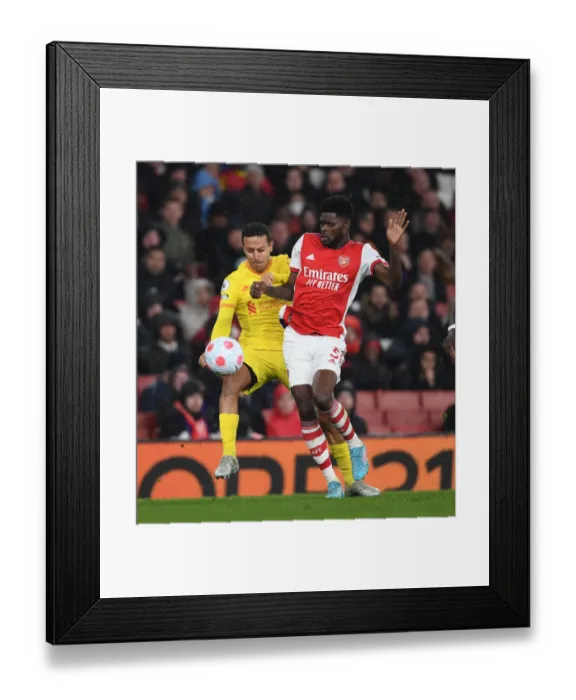 Framed Print : Thomas Partey vs. Thiago: Intense Battle in Arsenal v Liverpool Premier League Clash