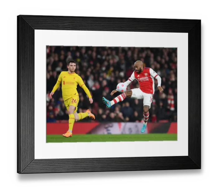 Framed Print : Arsenal vs Liverpool: Lacazette vs Robertson - Premier League Clash at Emirates Stadium