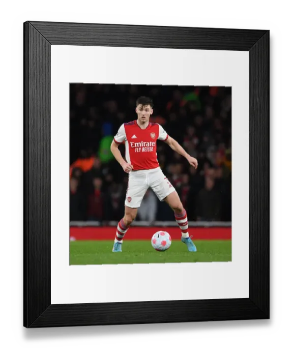 Framed Print : Arsenal's Kieran Tierney Goes Head-to-Head with Liverpool at the Emirates Stadium Framed Print : Arsenal's Kieran Tierney Goes Head-to-Head with Liverpool at the Emirates Stadium