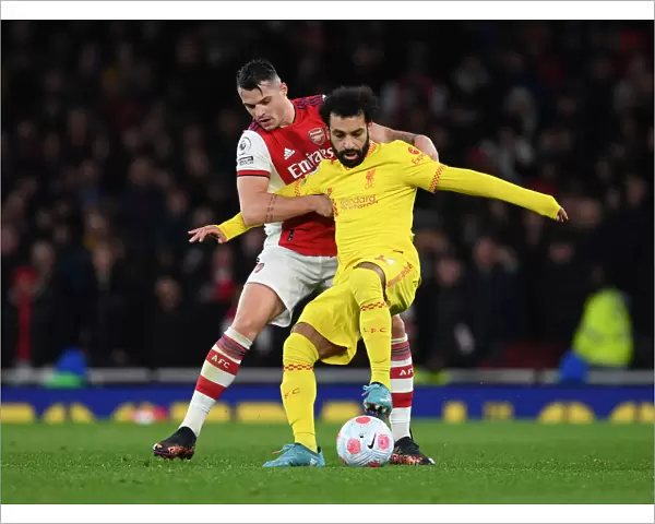 Arsenal vs. Liverpool: Xhaka vs. Salah - Intense Battle in the Premier League