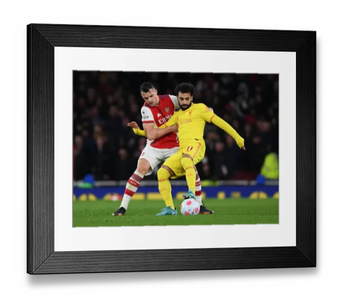 Framed Print : Xhaka vs. Salah: A Premier League Battle - Arsenal vs. Liverpool