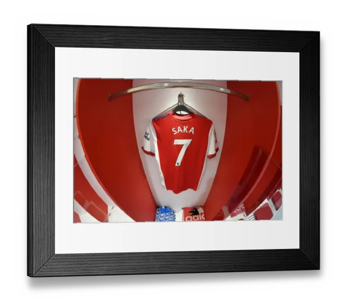 Framed Print : Arsenal vs Liverpool: Bukayo Saka's Hanging Jersey in Arsenal Changing Room (Premier League 2021-22)