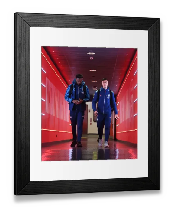 Framed Print : Arsenal's Okonkwo and Martinelli Arrive for Arsenal v Liverpool (2021-22) Framed Print : Arsenal's Okonkwo and Martinelli Arrive for Arsenal v Liverpool (2021-22)