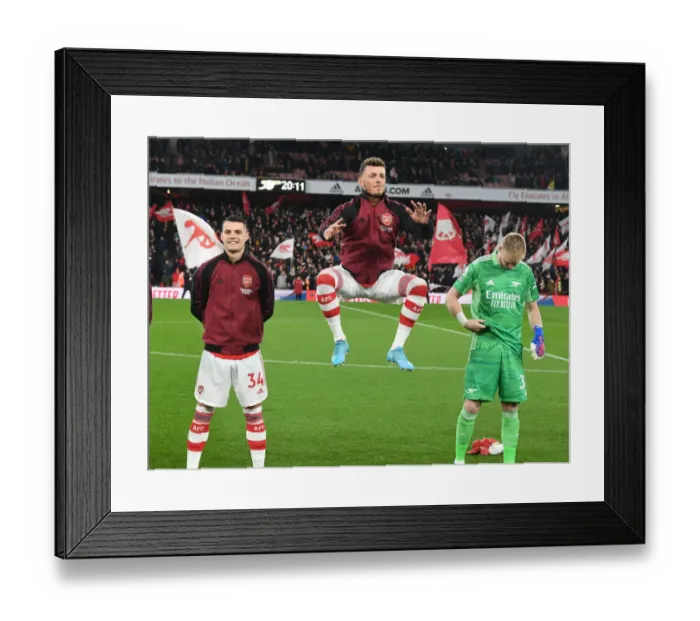 Framed Print : Arsenal's Xhaka, White, and Ramsdale Prepare for Liverpool Clash in Premier League (2021-2022)