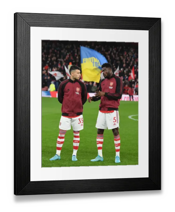 Framed Print : Arsenal's Martinelli and Partey Prepare for Arsenal v Liverpool Clash (2021-22) Framed Print : Arsenal's Martinelli and Partey Prepare for Arsenal v Liverpool Clash (2021-22)