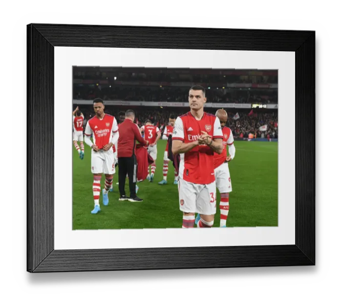 Framed Print : Granit Xhaka: Arsenal's Steely Gaze Ahead of Arsenal vs Liverpool Clash (Premier League 2021-22) Framed Print : Granit Xhaka: Arsenal's Steely Gaze Ahead of Arsenal vs Liverpool Clash (Premier League 2021-22)