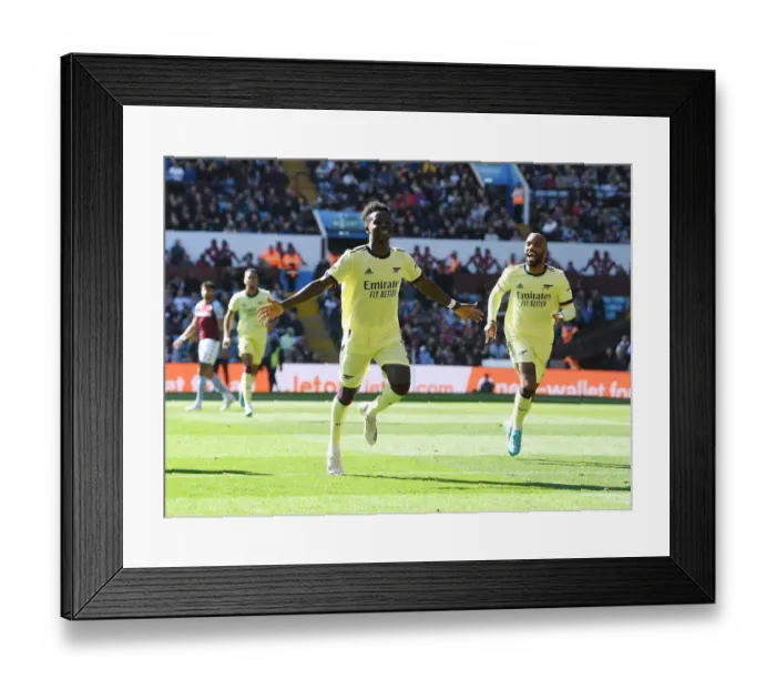 Framed Print : Saka Scores the Thriller: Arsenal's Triumph over Aston Villa in the Premier League 2021-22 Framed Print : Saka Scores the Thriller: Arsenal's Triumph over Aston Villa in the Premier League 2021-22