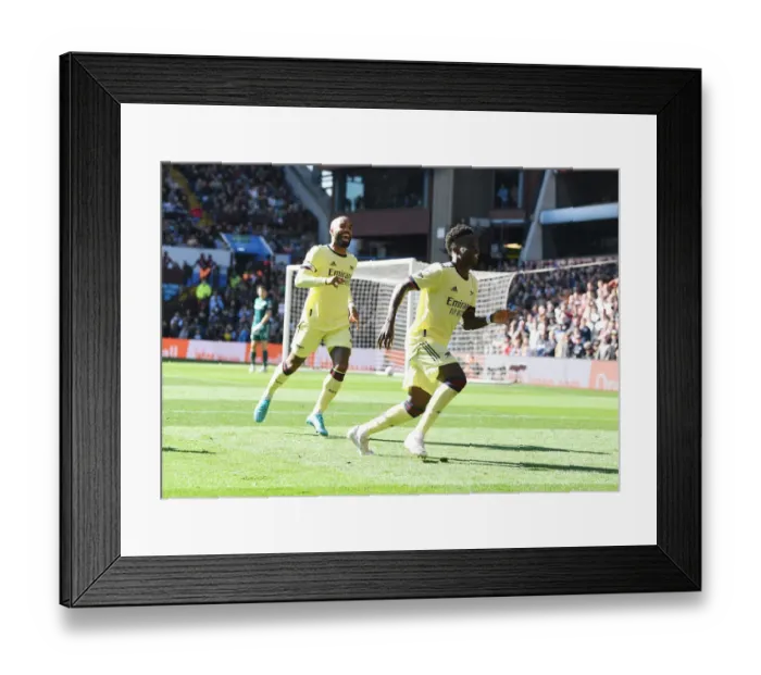 Framed Print : Saka's Stunner: Arsenal's Thrilling Victory over Aston Villa in the Premier League 2021-22