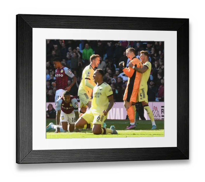 Framed Print : Arsenal Celebrate Hard-Fought Victory Over Aston Villa in Premier League Clash