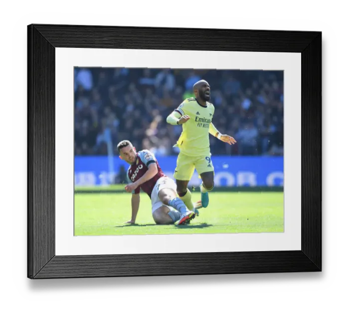 Framed Print : Arsenal's Lacazette Fouls by McGinn in Aston Villa vs Arsenal (Premier League, 2021-22)