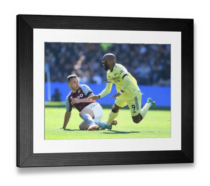 Framed Print : Lacazette Fouled by McGinn: Aston Villa vs Arsenal (2021-22) Framed Print : Lacazette Fouled by McGinn: Aston Villa vs Arsenal (2021-22)