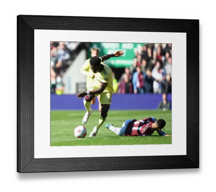 Framed Print : Saka vs. Ramsey: A Premier League Showdown at Villa Park Framed Print : Saka vs. Ramsey: A Premier League Showdown at Villa Park