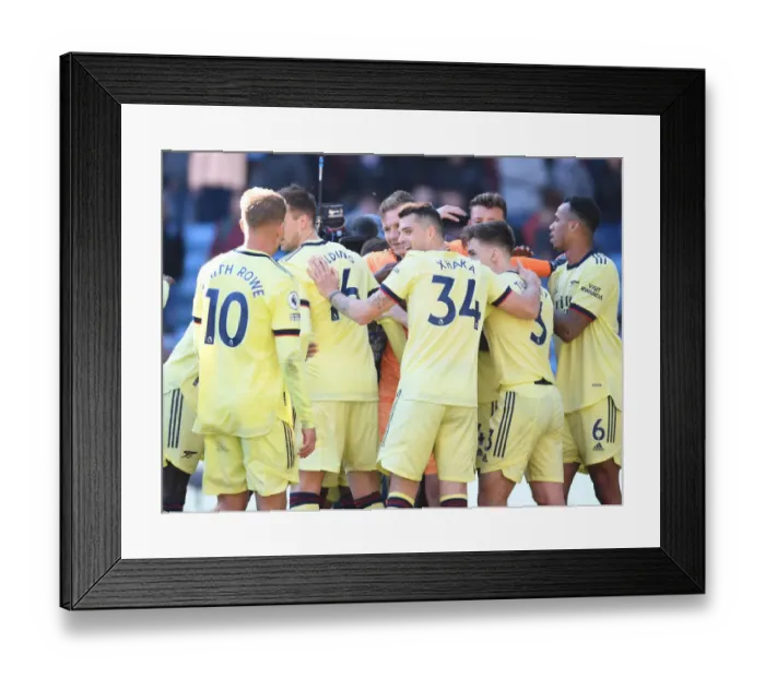 Framed Print : Arsenal Celebrate Win Against Aston Villa in Premier League