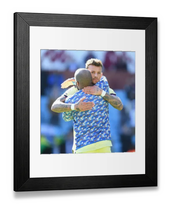 Framed Print : Arsenal's Lacazette and White Celebrate Victory over Aston Villa in Premier League Clash