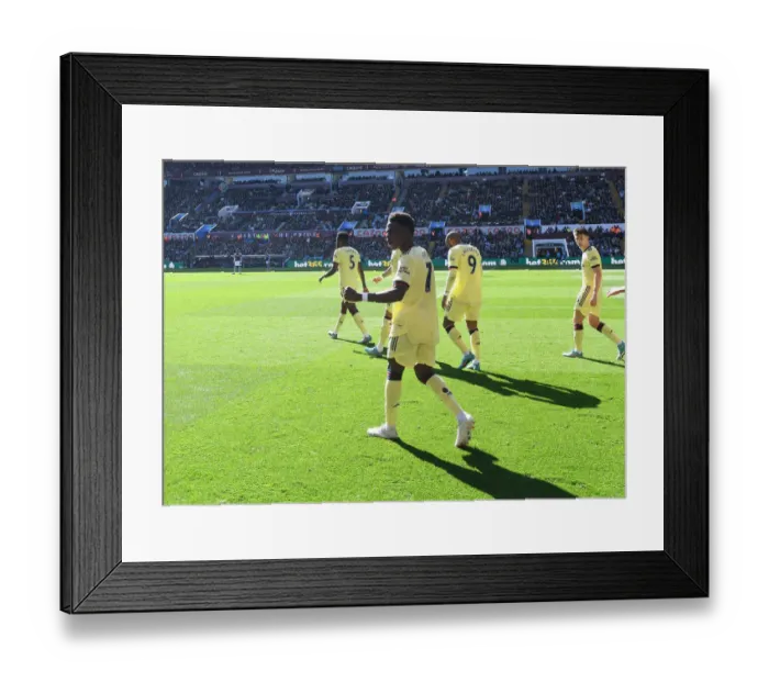 Framed Print : Saka Strikes: Arsenal's Thrilling Victory over Aston Villa in the Premier League 2021-22