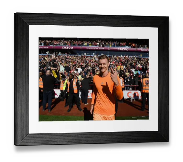 Framed Print : Bernd Leno's Triumph: Arsenal's Goalkeeper Celebrates Victory Over Aston Villa