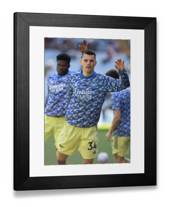 Framed Print : Granit Xhaka Gears Up: Aston Villa vs. Arsenal, Premier League 2021-22
