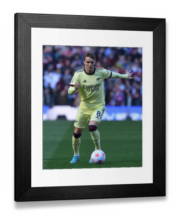 Framed Print : Martin Odegaard in Action: Arsenal vs. Aston Villa - Premier League Showdown