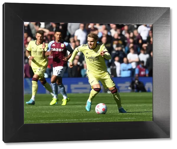 Martin Odegaard in Action: Arsenal vs. Aston Villa - Premier League Showdown