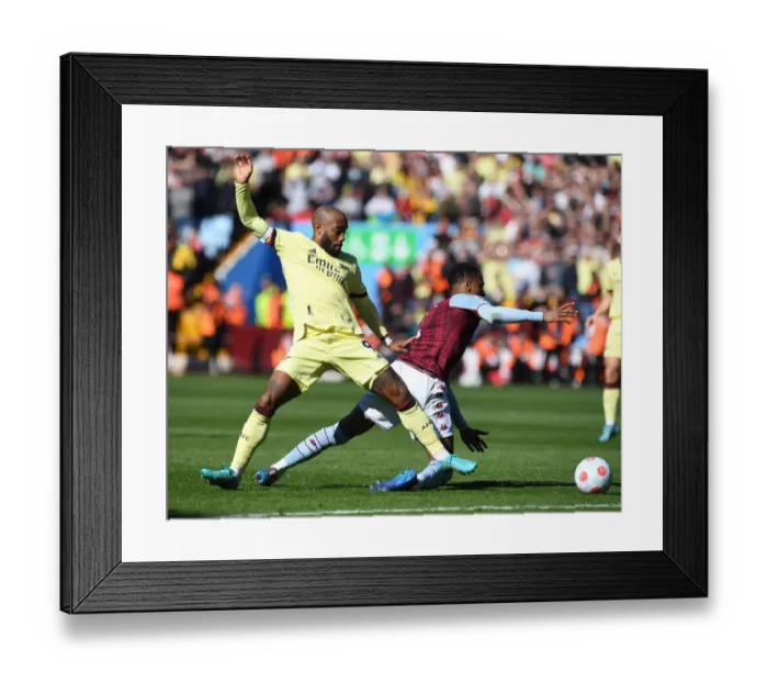 Framed Print : Clash at Villa Park: Lacazette Challenges Konsa in Premier League Showdown Framed Print : Clash at Villa Park: Lacazette Challenges Konsa in Premier League Showdown