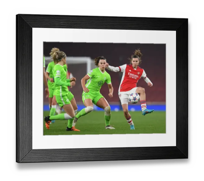 Framed Print : Arsenal vs. VfL Wolfsburg: Tobin Heath Faces Off Against Lena Oberdorf in UEFA Women's Champions League Quarterfinals