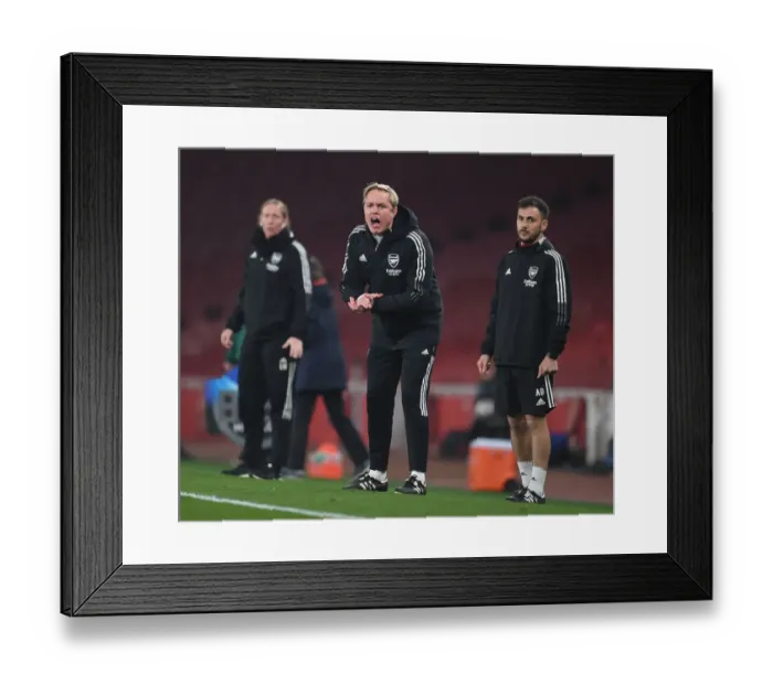 Framed Print : Eidevall and D Antino Lead Arsenal Women in Champions League Quarterfinal Clash against VfL Wolfsburg Framed Print : Eidevall and D Antino Lead Arsenal Women in Champions League Quarterfinal Clash against VfL Wolfsburg