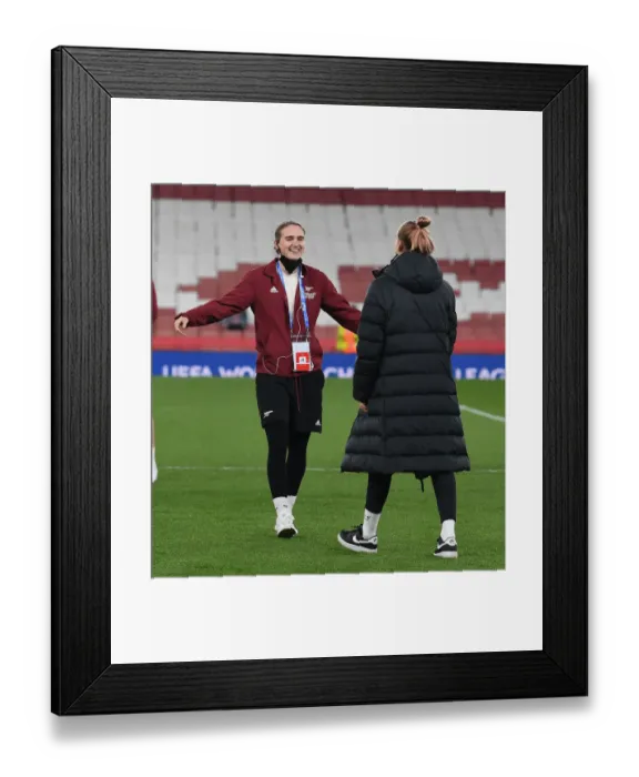 Framed Print : Arsenal WFC vs. VfL Wolfsburg: Viviane Miedema and Jill Roord Embrace Ahead of UEFA Women's Champions League Quarterfinal