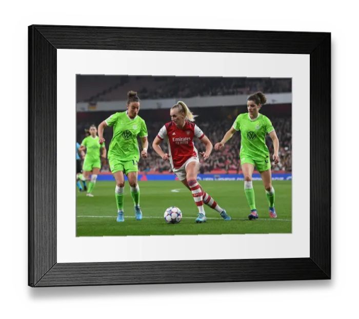 Framed Print : Arsenal vs. VfL Wolfsburg: A Battle in the Women's Champions League Quarterfinals